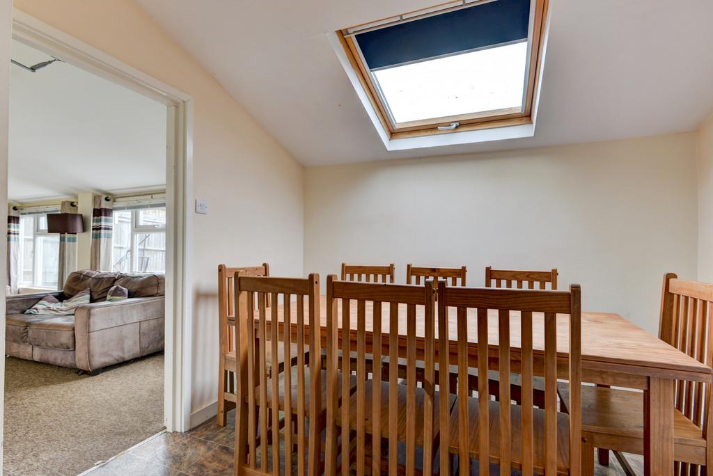 Bright, neatly presented dining area opening in...