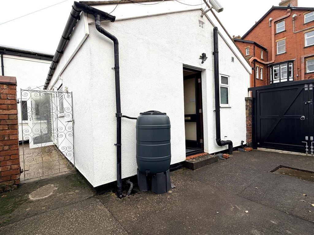 Rear courtyard/parking space
