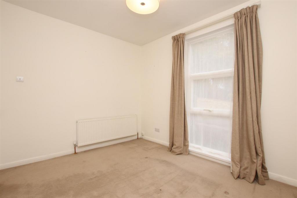 Bedroom two (2).JPG
