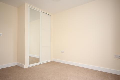 undefined, Woking GU21