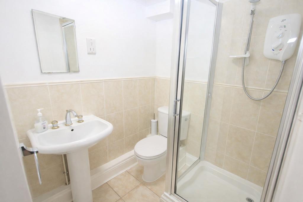 Bright modern bathroom with white fixtures