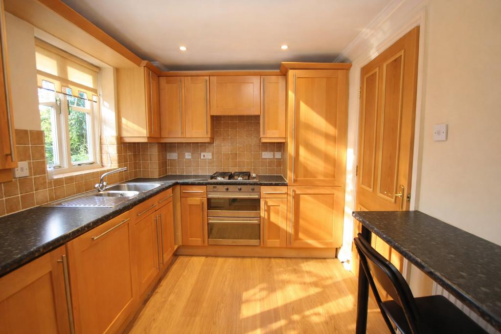 Sunny kitchen with wooden accents