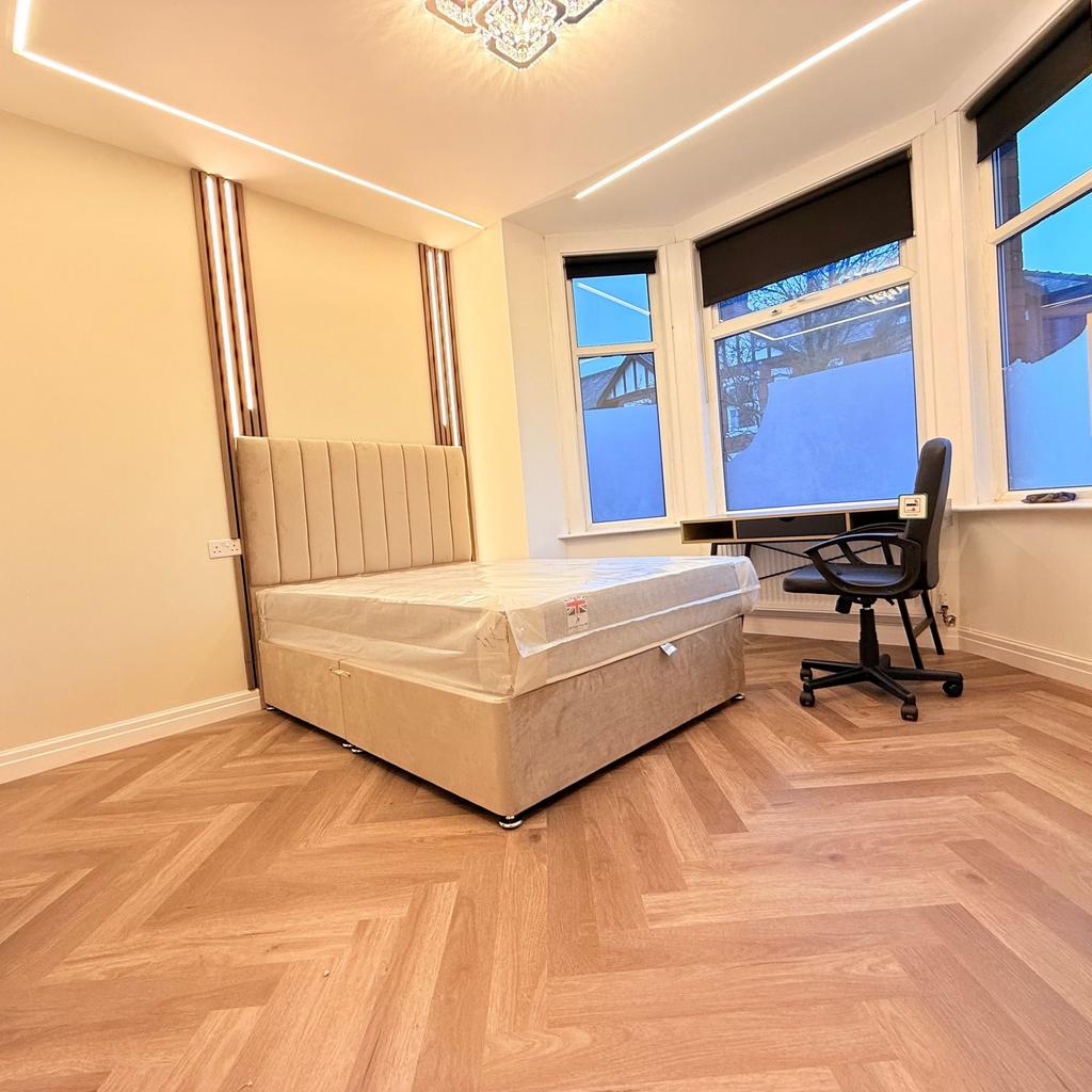 Bright, recently refurbished bedroom with a plu...