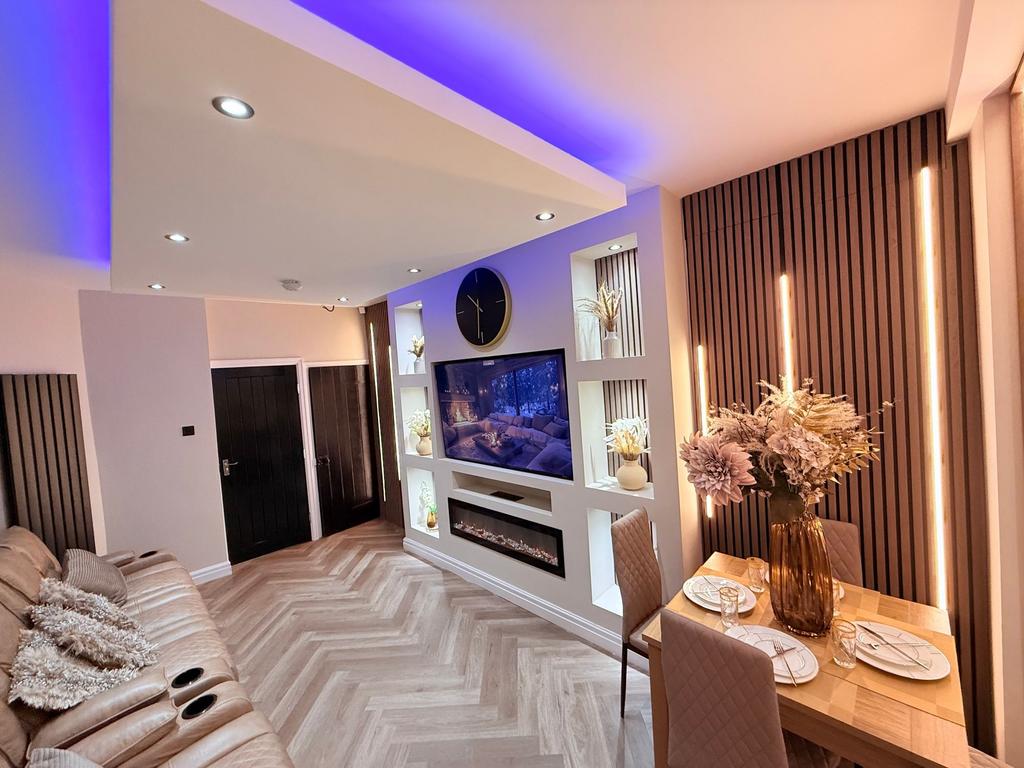Stylish open-plan living room with a comfy leat...