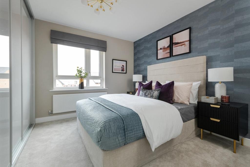 The main bedroom offers space to unwind and relax