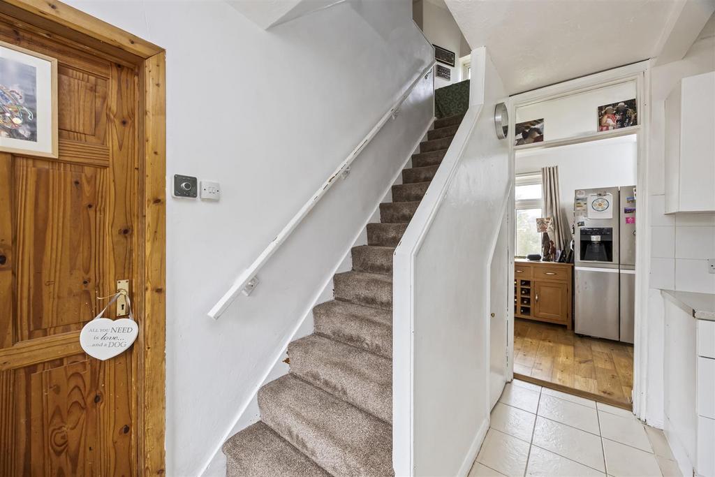 Stairs rising to First Floor