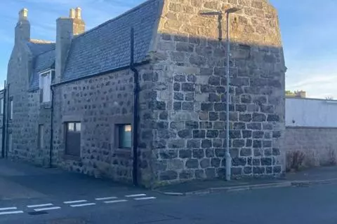 12 bedroom property with land for sale