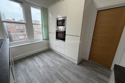 undefined, Portland St, Manchester M1