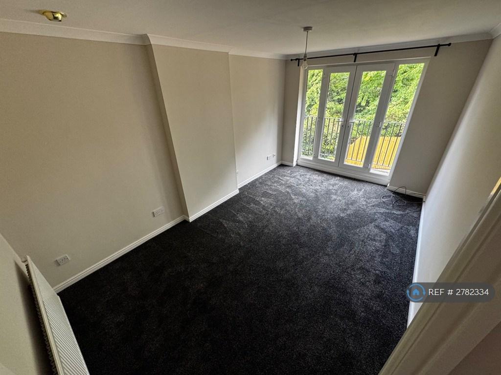 Living Room With French Doors To Balcony