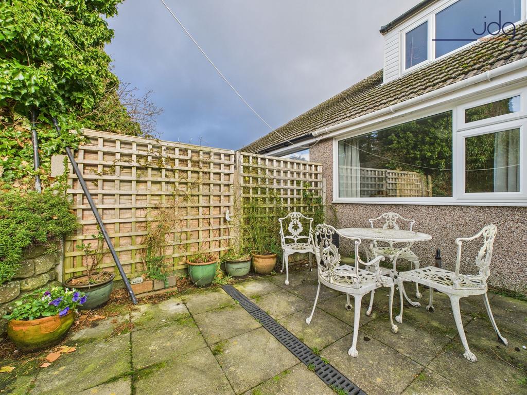 West-facing rear garden catching afternoon and...