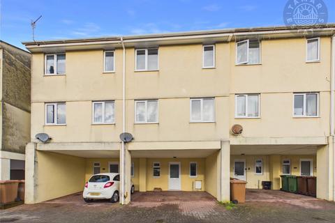 'Ideal family living across three floors, complemented by a double carport and enclosed rear garden'