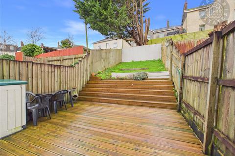 4 bedroom terraced house for sale, 'Ideal family living across three floors, complemented by a double carport and enclosed rear garden'