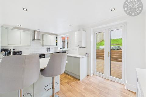 4 bedroom terraced house for sale, 'Ideal family living across three floors, complemented by a double carport and enclosed rear garden'