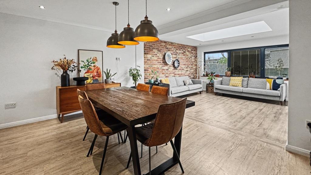 Spacious open-plan living and dining area with ...