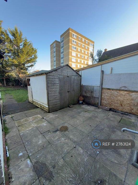 1/2 Shed In Garden