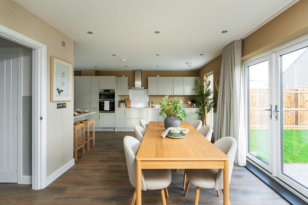 The dining area overlooks the rear garden
