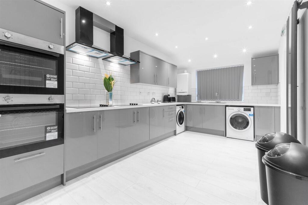 Modern, well-appointed kitchen with sleek cabin...