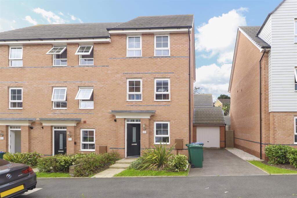 Well-presented modern terraced home with neat f...