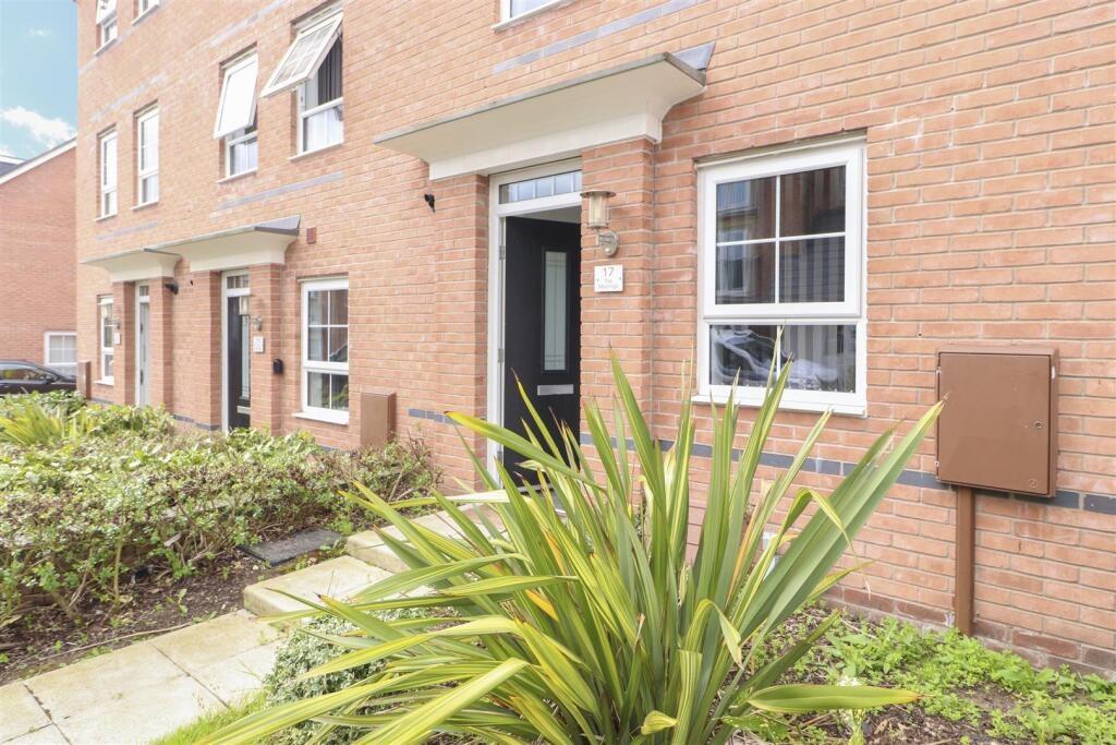 Attractive brick-fronted terraced property with...
