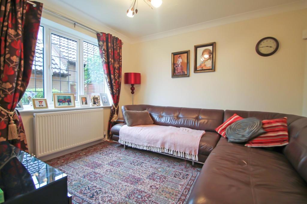 Bright, cozy living room with a large L-shaped ...