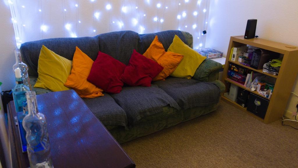 A cozy and inviting living room with colorful c...