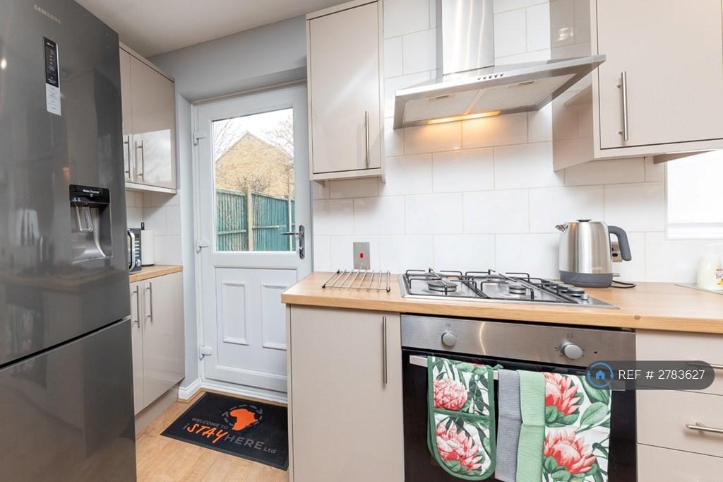 Kitchen With Door Leading Outside