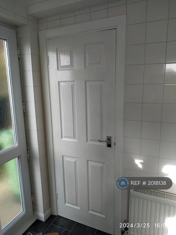 Door To Understairs Cupboard And Outside