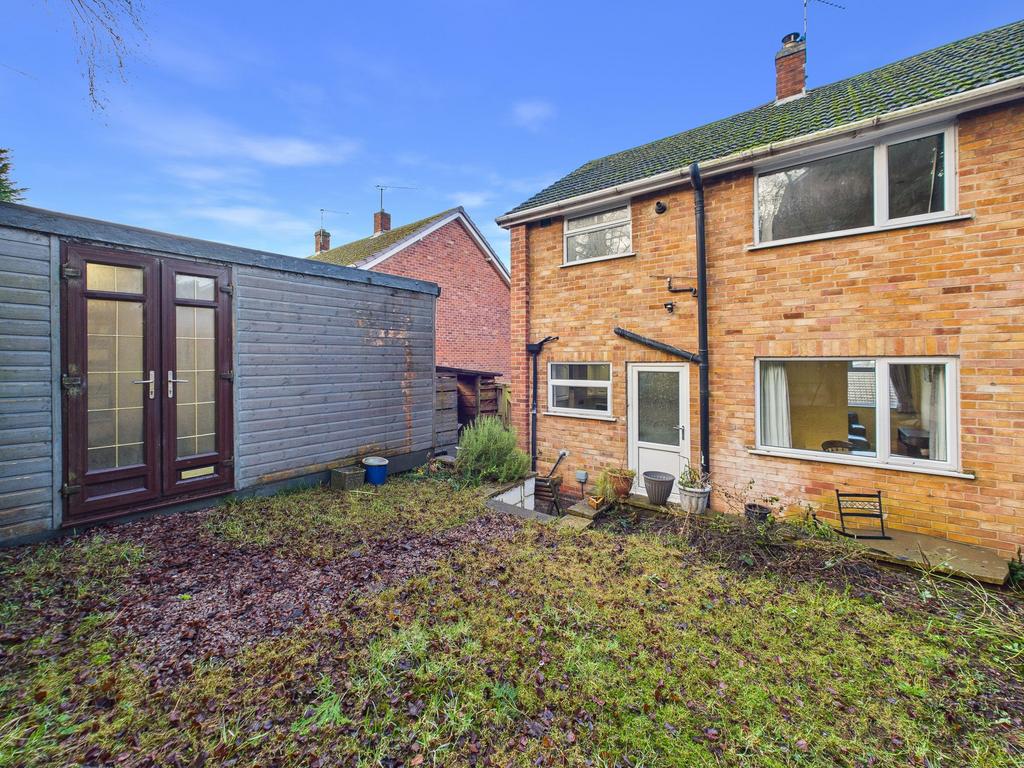 Rear Garden and Wooden Outbuilding
