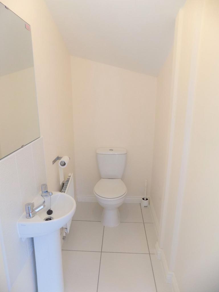 Neat, recently refreshed WC with a white toilet...