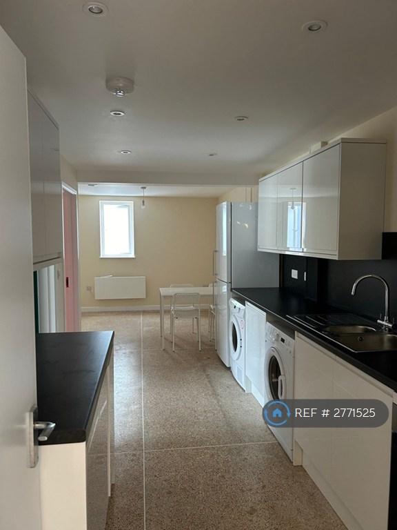 Kitchen With Shared Fridge Freezer