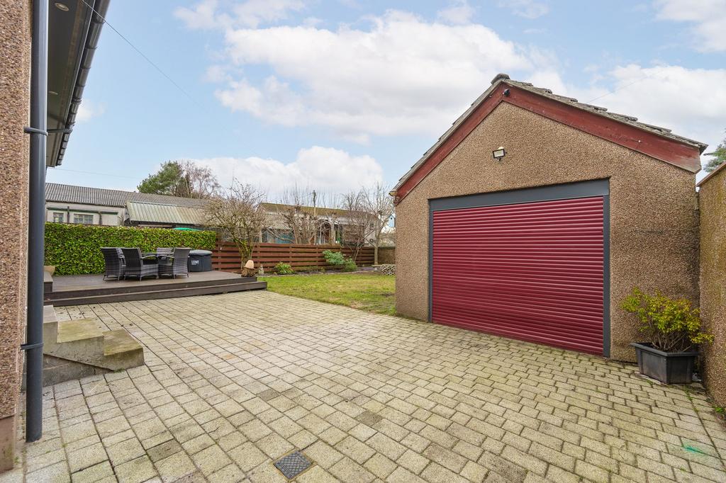 Detached Garage/ Driveway