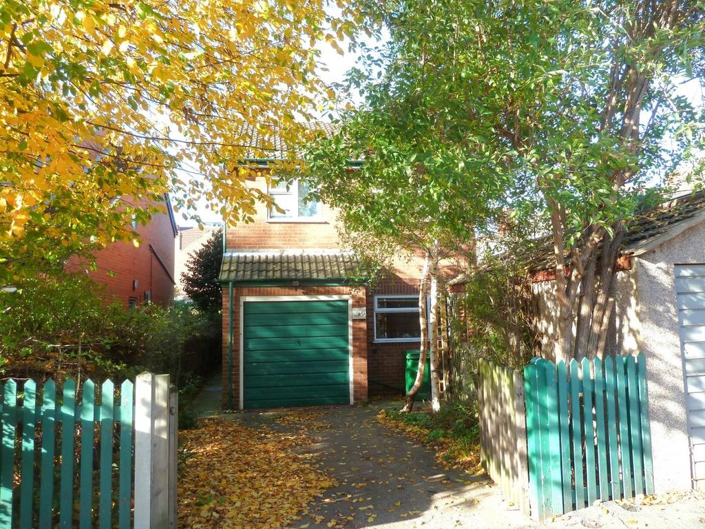 Charming detached house front with a single gar...