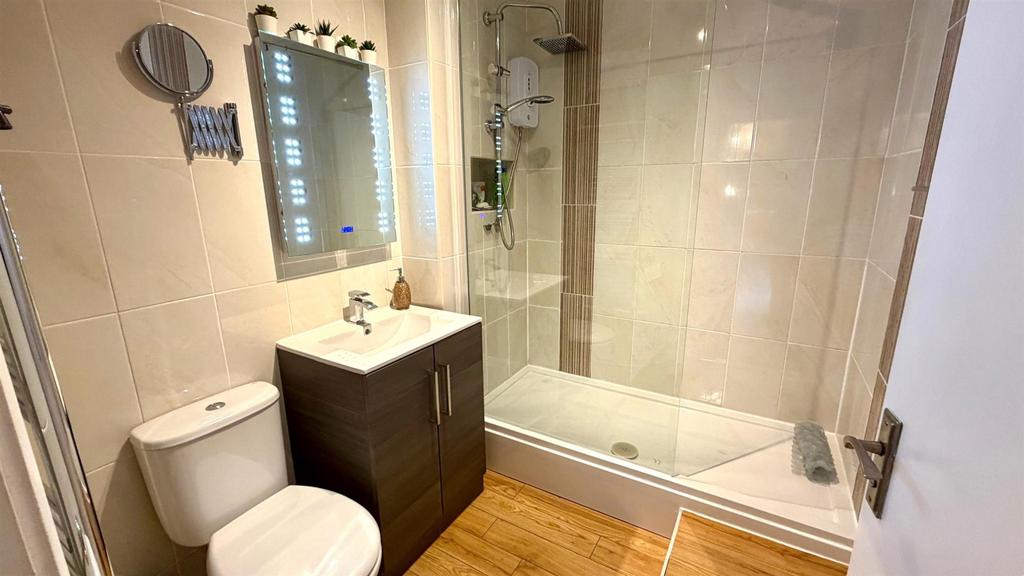 Tiled 3 piece shower room