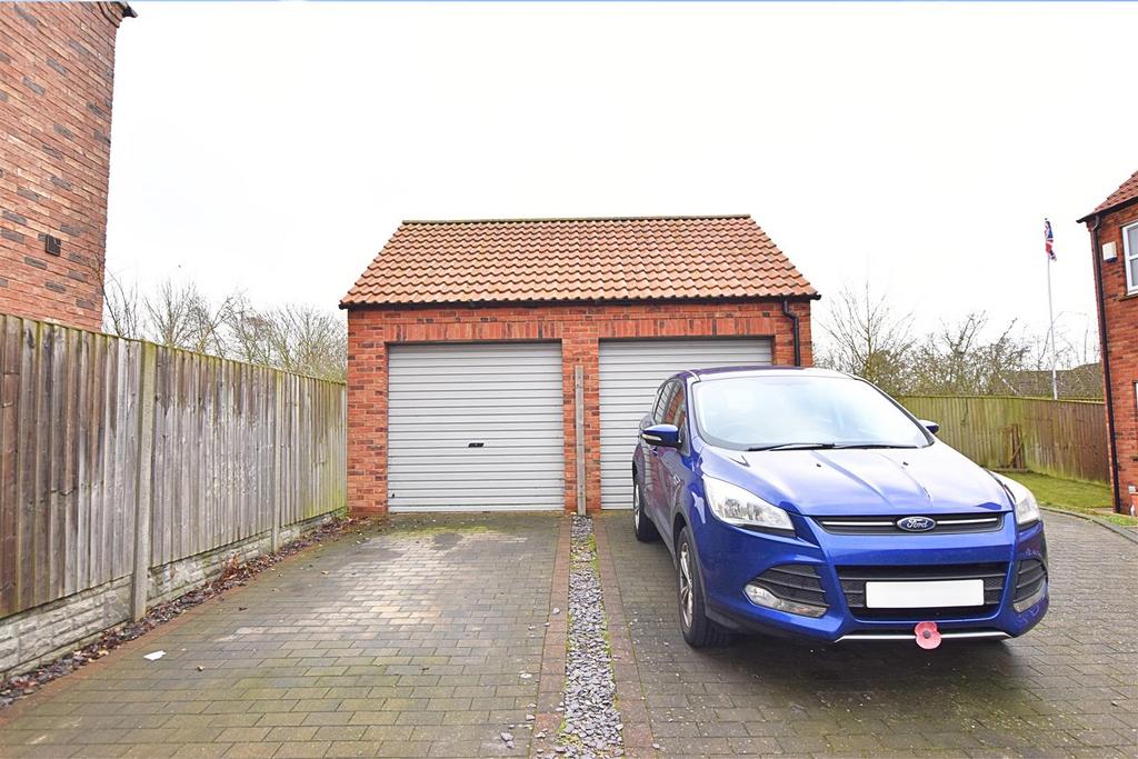 Semi detached brick garage