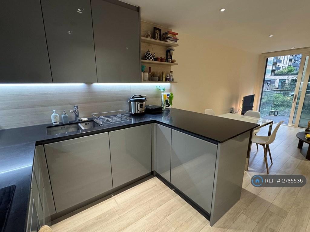 Kitchen - Island Overlooking Room