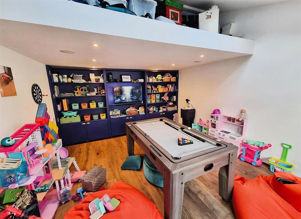 Garage Currently Used As Play Room and Storage