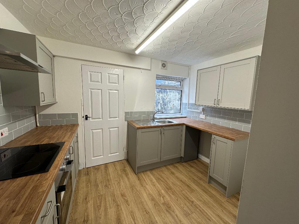 Kitchen showing washing machine gap