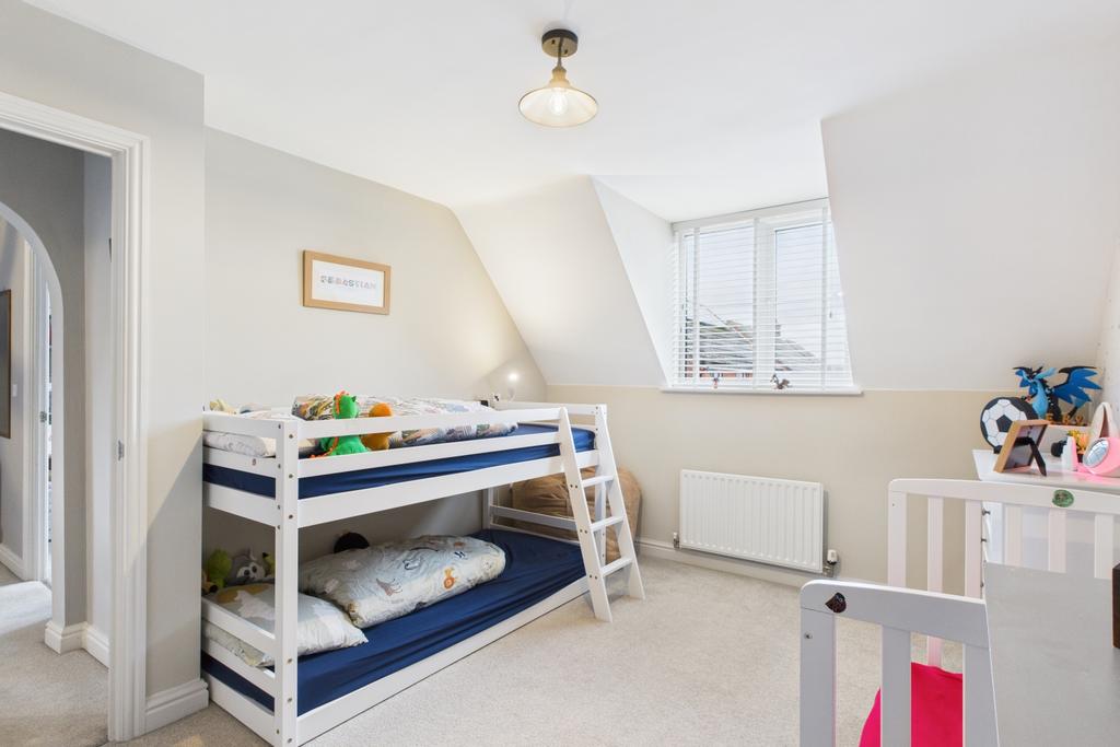 Large double bedroom with built in cupboard
