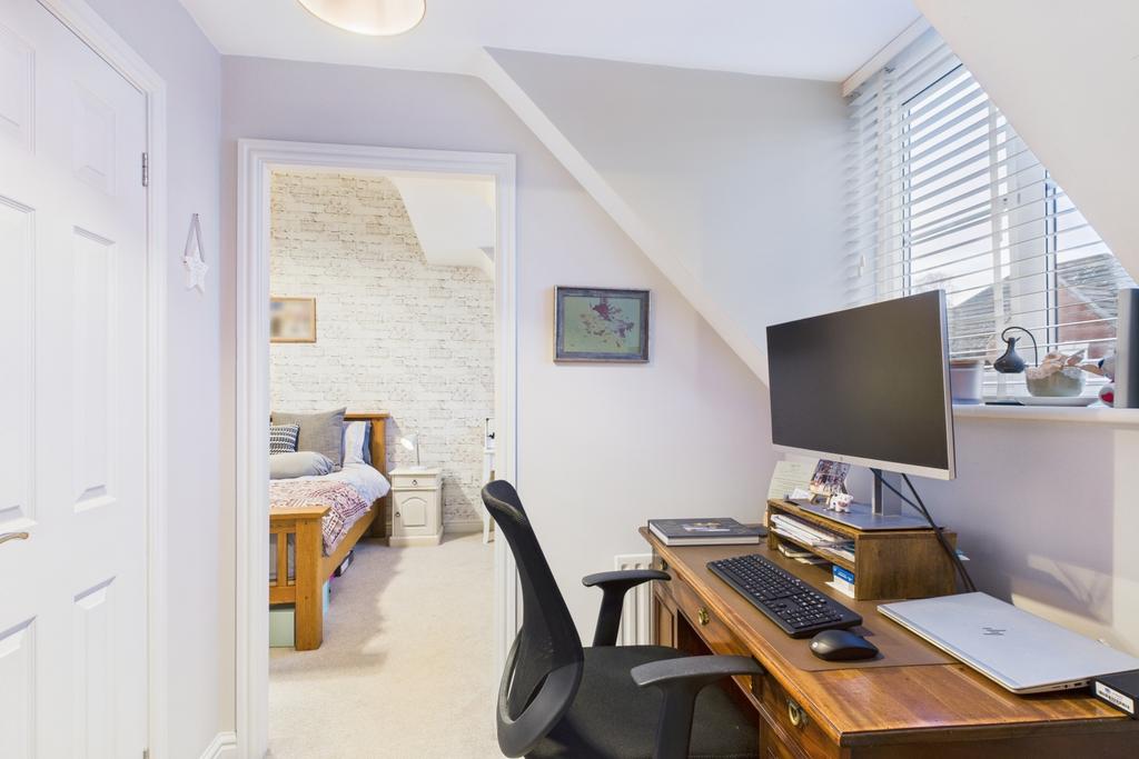 Dressing area with built in wardrobes to principle
