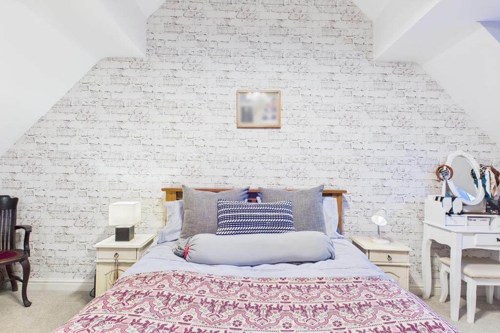 Show-stopping pitched ceiling in principle bedroom