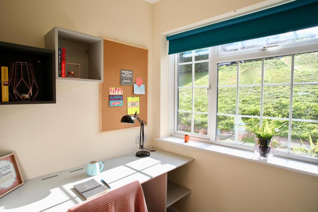 A bright and inviting study area with ample nat...