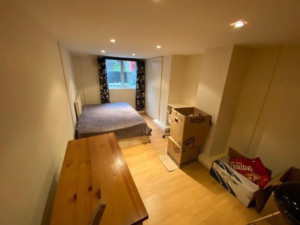 Bright, neatly presented bedroom with a double ...