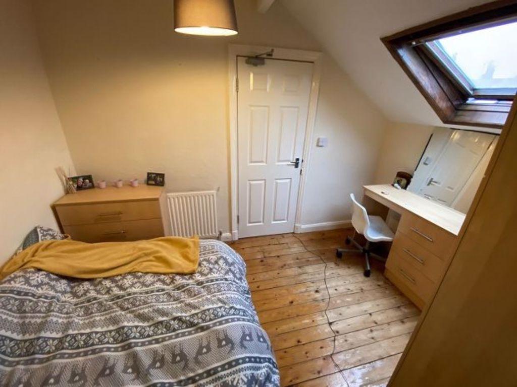 Cozy furnished bedroom with a comfortable bed, ...