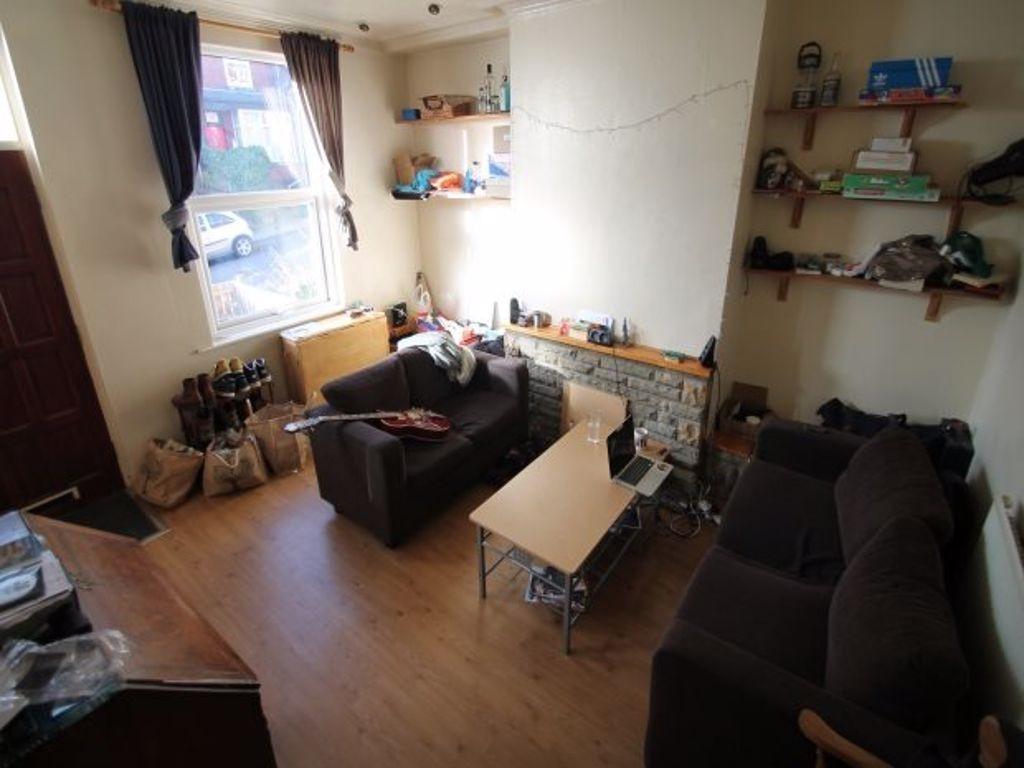 Comfortable shared living room with seating, co...