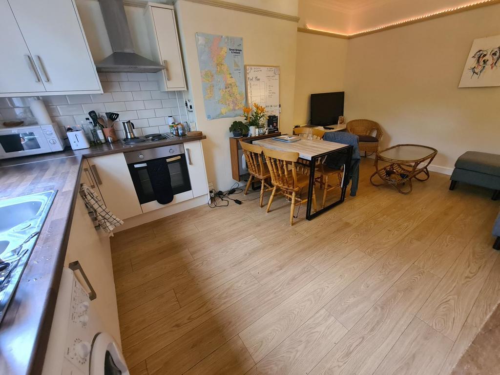 Bright open-plan kitchen with modern appliances...