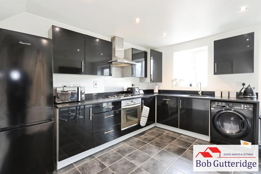 Open plan fitted kitchen / dining room