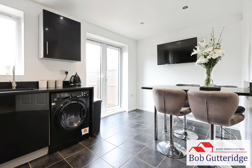 Open plan fitted kitchen / dining room