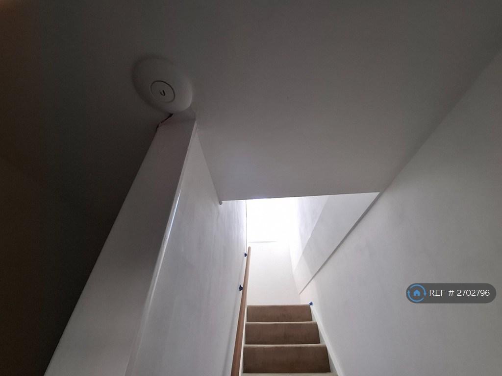 Wireless Repeaters On Each Floor.