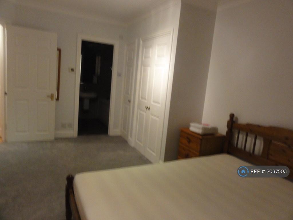 With Fitted Wardrobes