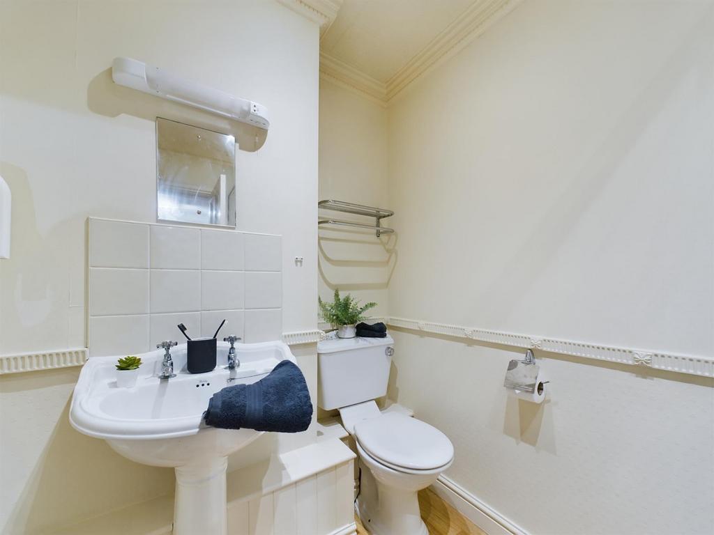 A clean and bright bathroom with modern fixture...